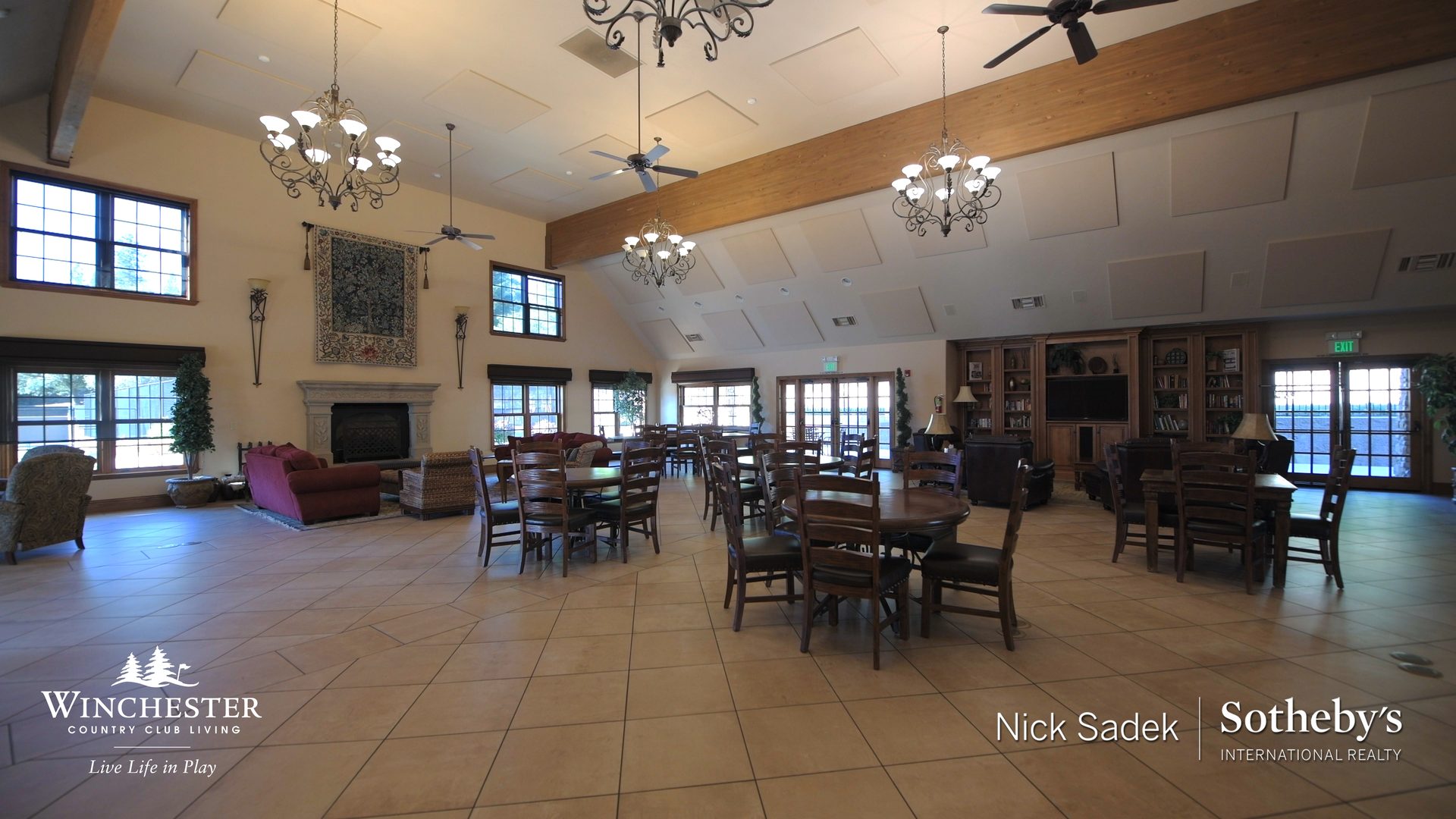 Great hall with fireplace and vaulted ceilings